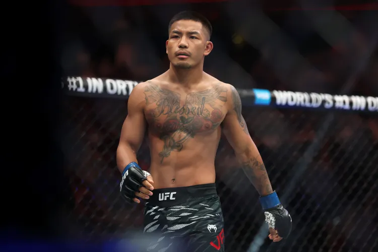 Van Overcomes Taira’s Wrestling Pressure to Retain UFC Flyweight Title