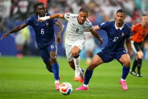 Mbappé Double Powers France Past Iraq in Weather Hit World Cup Clash