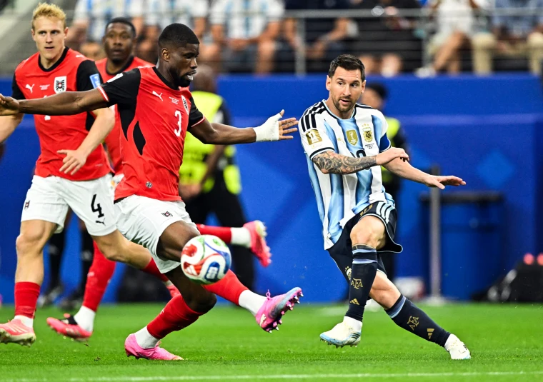 Messi Makes History as Argentina March Into the Last 32