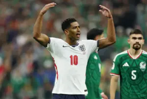 Ten Man England Hold Firm in Famous World Cup Win
