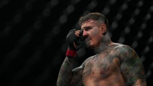 Injured Aspinall Steps Away From Heavyweight Title to Focus on Recovery