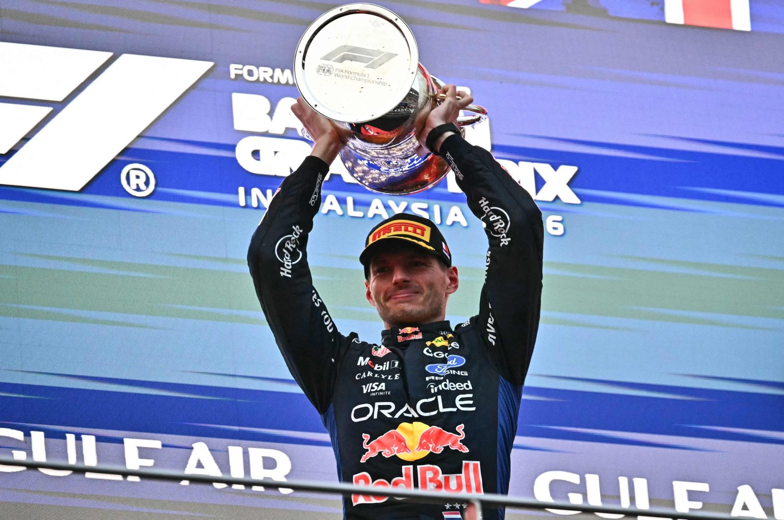 Verstappen Conquers Sepang Chaos as Hamilton Storms Back to Podium in Rain Hit Thriller
